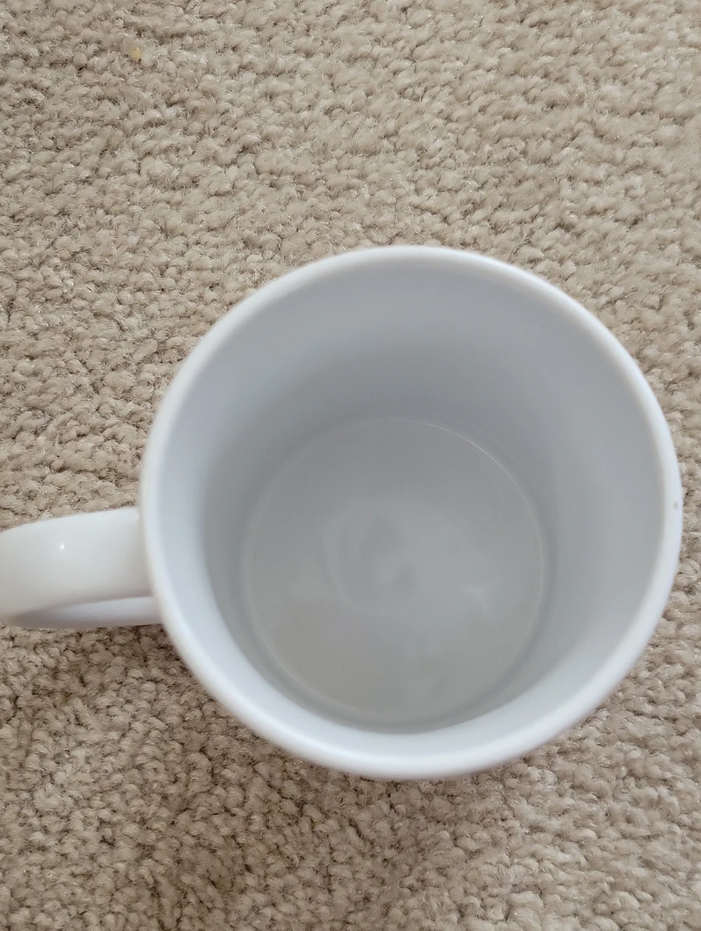 White Ceramic Mug with Black Text 